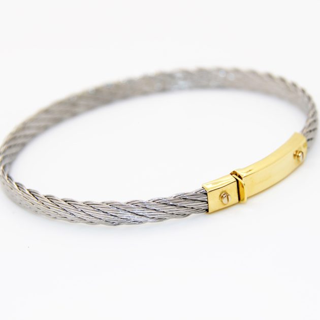 Bracelet homme en acier avec boucle en or 18K, design moderne et robuste.