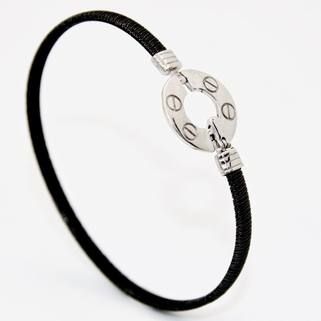 Bracelet homme en acier avec boucle en or 18K, design moderne et robuste.