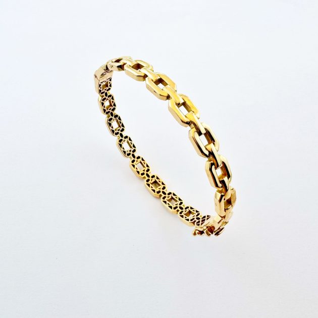 Bracelet moderne en or 18K, design minimaliste et élégant.