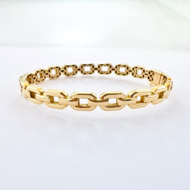 Bracelet moderne en or 18K, design minimaliste et élégant.