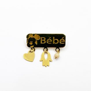 Broche pour bébé en or délicatement conçue, idéale pour un cadeau raffiné.